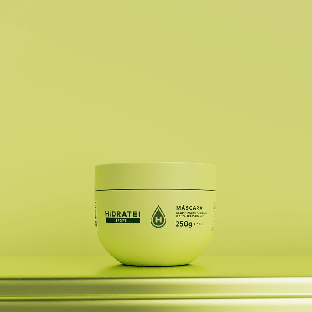 Pote de m&aacute;scara capilar Hidratei Sport verde-lim&atilde;o, com tampa, sobre uma superf&iacute;cie verde-lim&atilde;o, em um fundo verde-lim&atilde;o. O r&oacute;tulo branco indica 